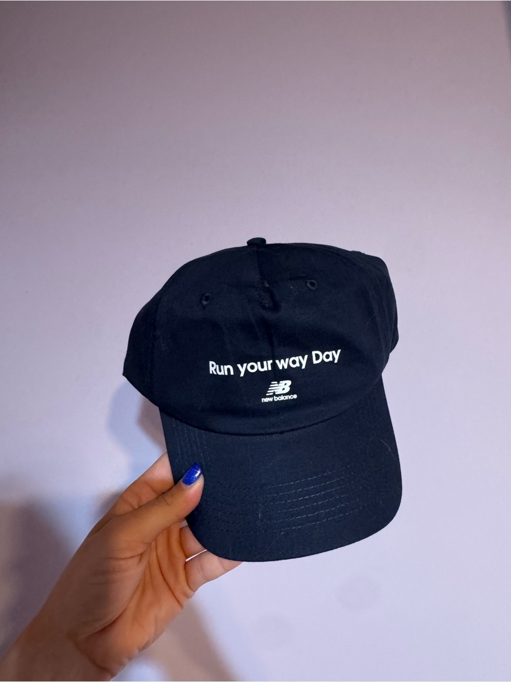 New Balance Black Baseball Cap with White Embroidered Slogan